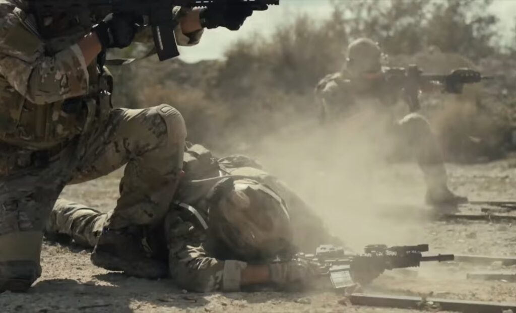 military men shoot a weapon