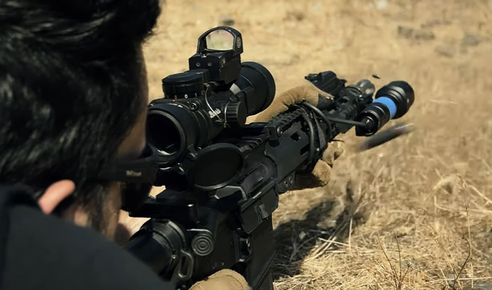 Man shoots a weapon