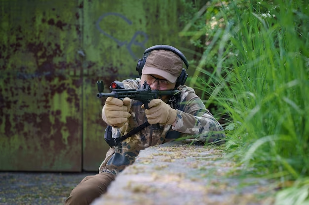 A man shoots a shotgun