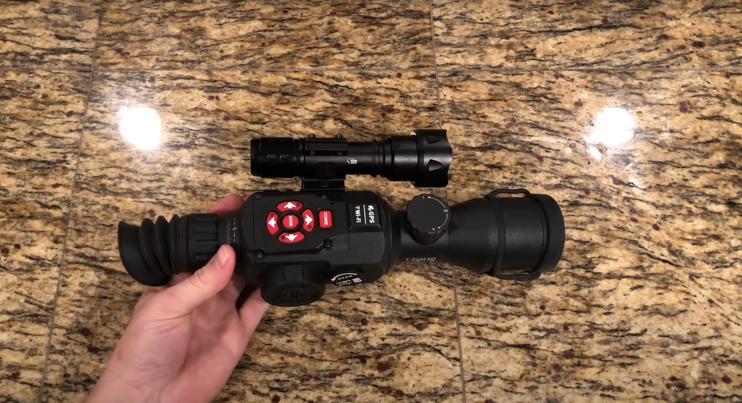 ATN X-Sight 2 in hand